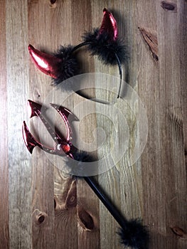 Red devil`s fork with sparkingly `stones and hair band with red devil horns