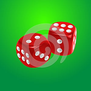 Red dice on green background