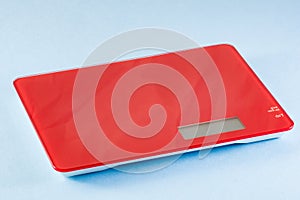Red Digital Kitchen Scale on blue background