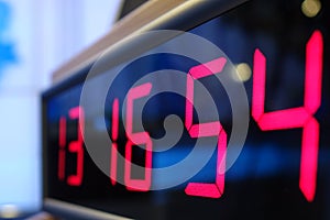 Red digital Timer, numbers counting.