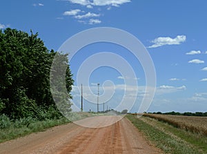 Red dirt road, rural north central Oklahoma photo