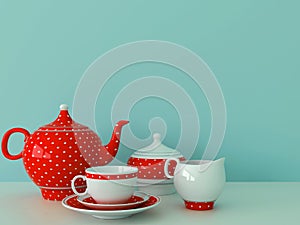 Red dishware on a blue background