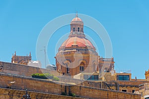 Red dome of a church in Valletta,  Malta