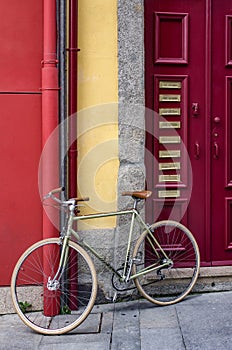 Red door and bicycle