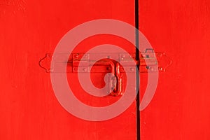 Red door with bolt photo