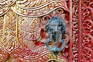 Door handle with lion design on buddhist temple