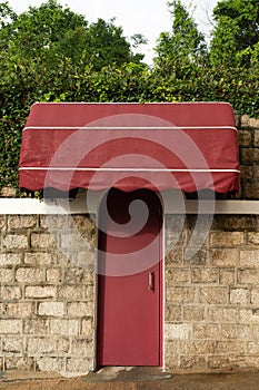 RED DOOR ON THE BRICK