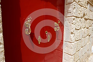 The red door of house at Mdina town