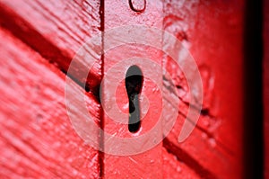 Red door with old key hole