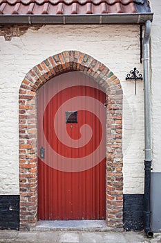 Red door in stone building