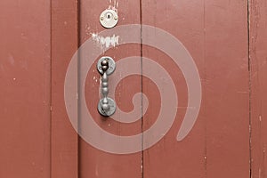 red door straight metal knob 1