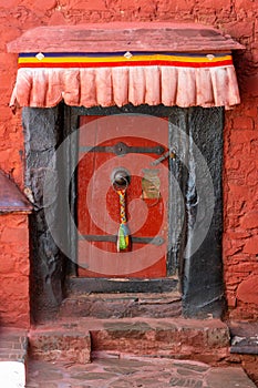 Red door in Tashilhunpo Monastery Tibet, China