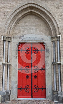 Red door of the Walburgis church in Zutphen