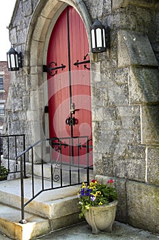 Red doors, stone facade and black ironwork, Keene, New Hampshire
