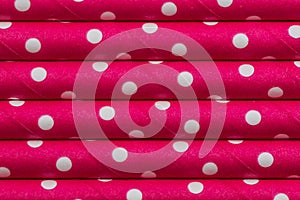 Red dot paper straw closeup background