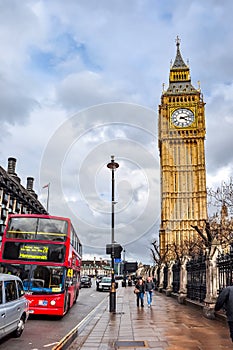 Red double-decker bus and Big Ben tower, London, UK