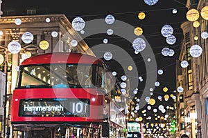 Red double decker bus in London during Christmas time