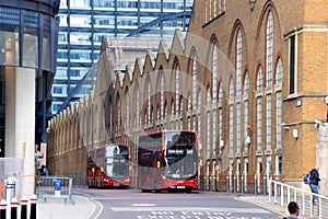 Red double-decker buses at Liverpool Street Station, London