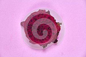 Red dragon fruit Set with appetizing serving on pink background. Top view