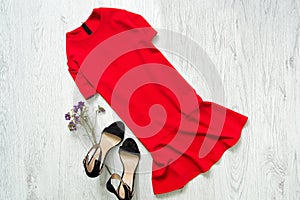 Red dress and black shoes. Fashionable concept