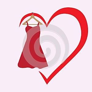 Red dress on a wooden hanger hanging on a red heart shape, love clothes concept