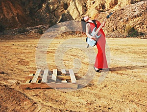 RED DRESSED ROCKER WOMAN photo