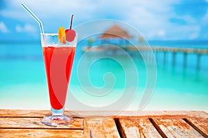 Red drink at a beach resort