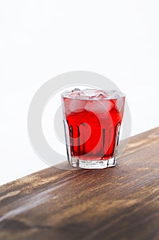 Red drink with ice