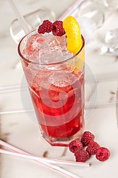 Red drink with raspberries