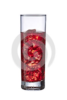 Red drink in tall glass with ice cubes isloated