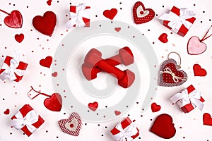 Red dumbbell with hearts and gift boxes on white background