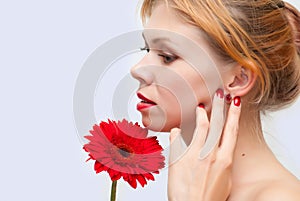 Red ear rings, nails and flower