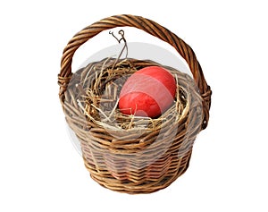Red Easter egg in the basket