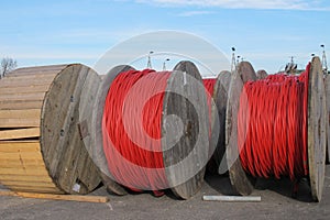 Red electrical cable reels for the transport of electricity high