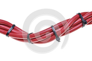 Red electrical cables with cable ties