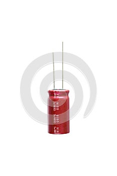 Red electrolytic capacitor Isolated on white background, Electronics part concept.