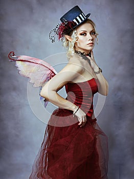 Red elf fairy in fancy hat