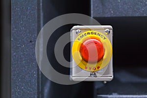 The red emergency button or stop button for Hand press. STOP Button for industrial machine