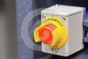 The red emergency button or stop button for Hand press. STOP Button for industrial machine