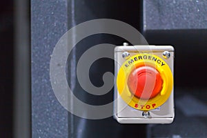 The red emergency button or stop button for Hand press. STOP Button for industrial machine