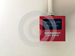 Red emergency door release