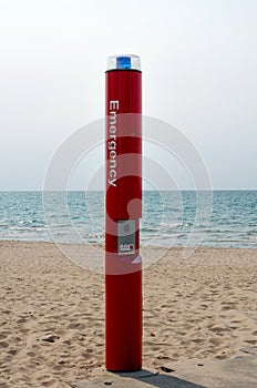 Emergency phone on the beach photo