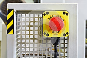 Red emergency stop push button on engine