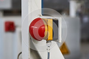 Red emergency stop switch reset button