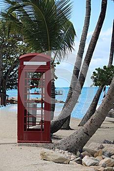 Red English Telephone Booth on Beach