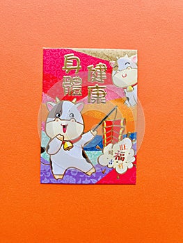 red envelope. A cute image of a cow holding a firecracker with the words \'Good Health\' .