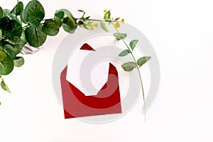 Red envelope with empty white card for text on white background