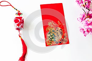 Red envelope put on white background, red envelope is gift,  blossom and chinese lantern on special days such as chinese new year