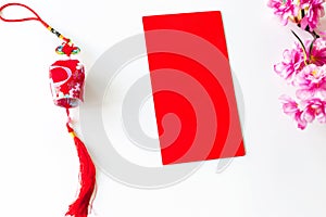 Red envelope put on white background, red envelope is gift,  blossom and chinese lantern on special days such as chinese new year