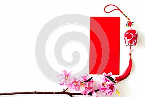 Red envelope put on white background, red envelope is gift,  blossom and chinese lantern on special days such as chinese new year